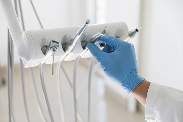 Professional Tooth Extraction technician working in Columbus, KS